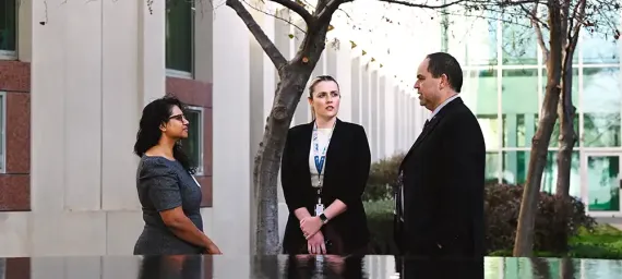 Colleagues having a discussion outside